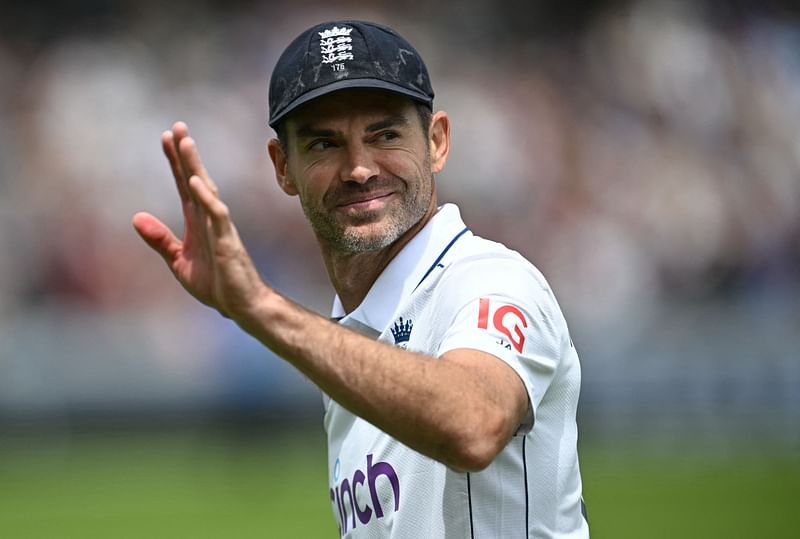 England’s James Anderson waves to the crowd during a presentation ceremony after the conclusion of play on the third day of the first Test cricket match between England and West Indies at Lord’s Cricket Ground in London on 12 July, 2024, after England beat West Indies by an innings and 114 runs